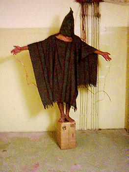 Пытки заключённых в тюрьме Абу-Грейб